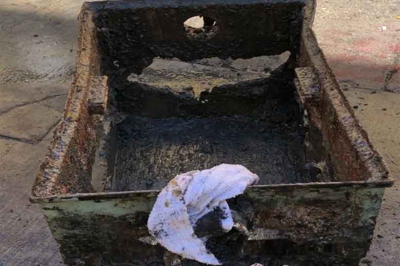 Corroded Grease Trap Requiring Repair