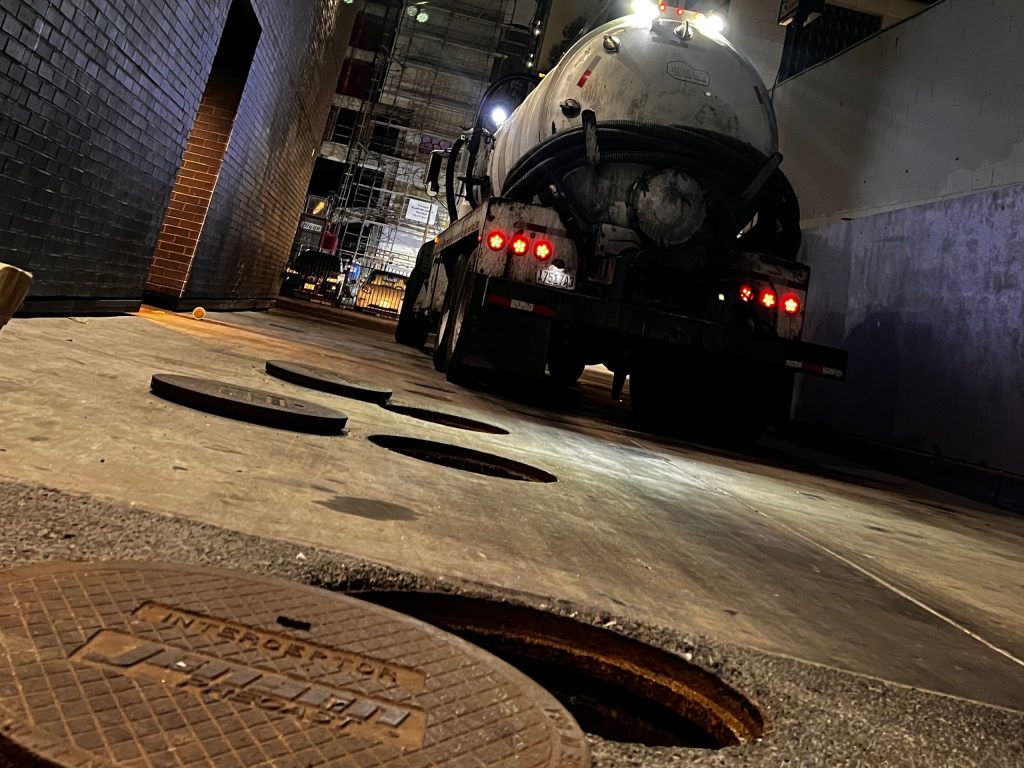Pumping truck used for grease interceptor cleaning in San Diego commercial kitchens