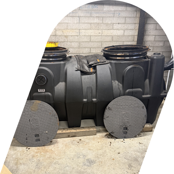 large underground grease trap being serviced professionally