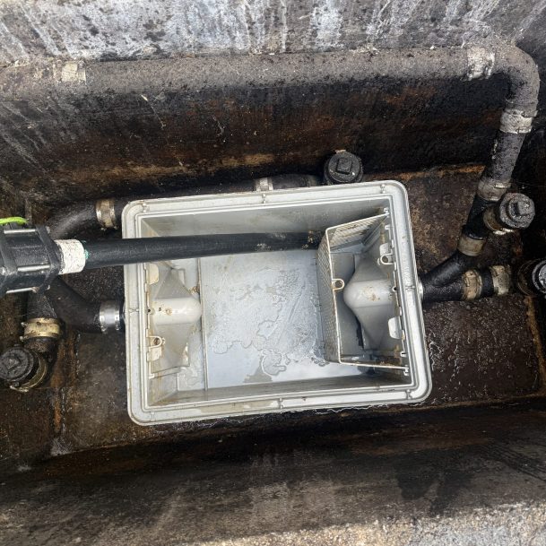 Empty grease trap after professional Chula Vista grease trap cleaning in a commercial kitchen